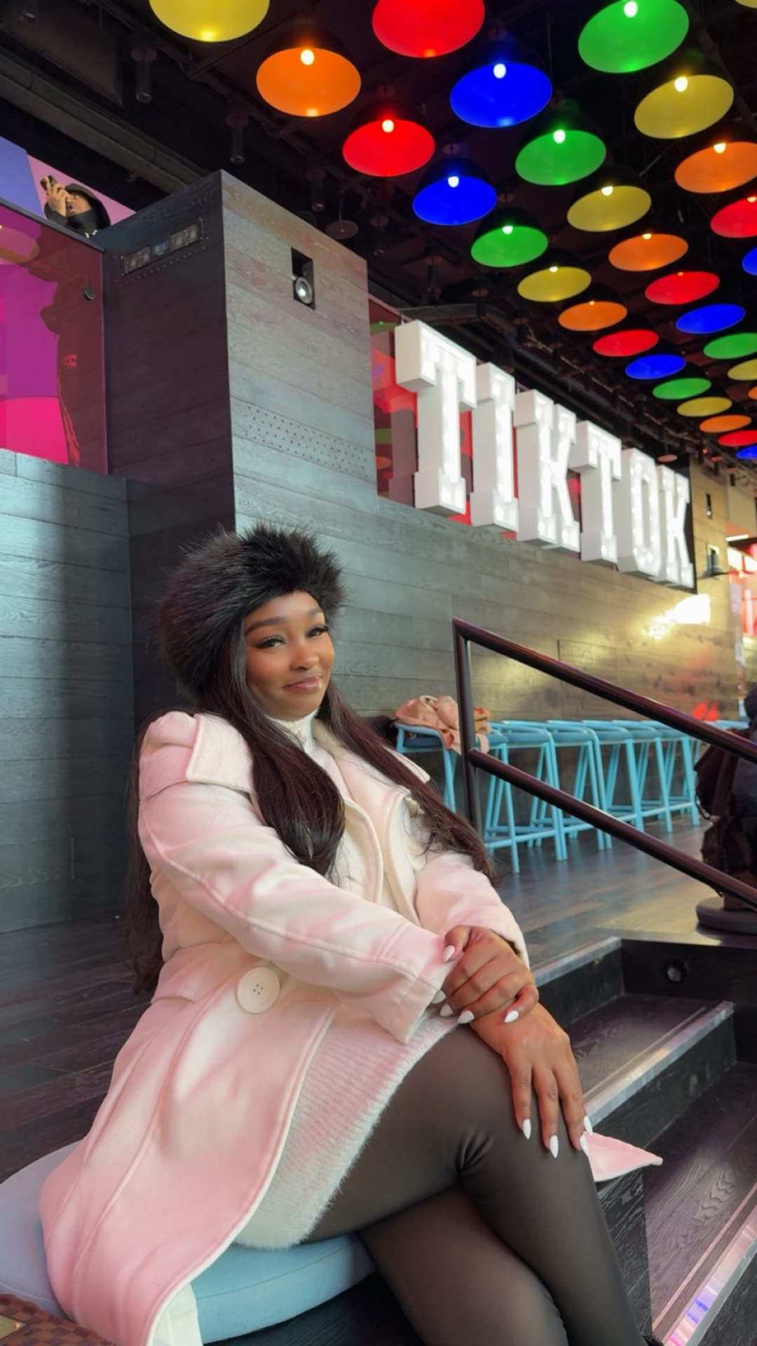Bree at the TikTok sign in New York City